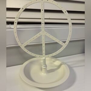 Peace symbol shaped earring/ jewelry holder from Pottery barn teen